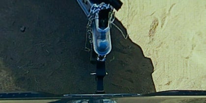 A rear camera facing a tow hitch
