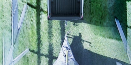 A rear camera facing a tow hitch